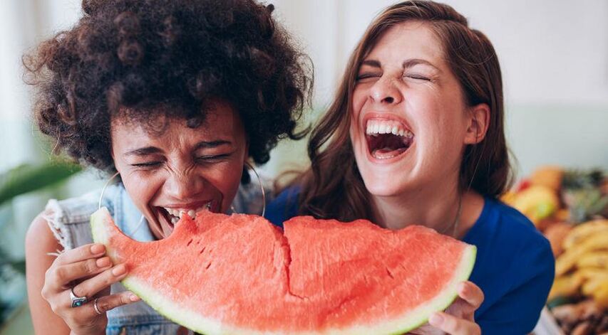 Girl eats watermelon